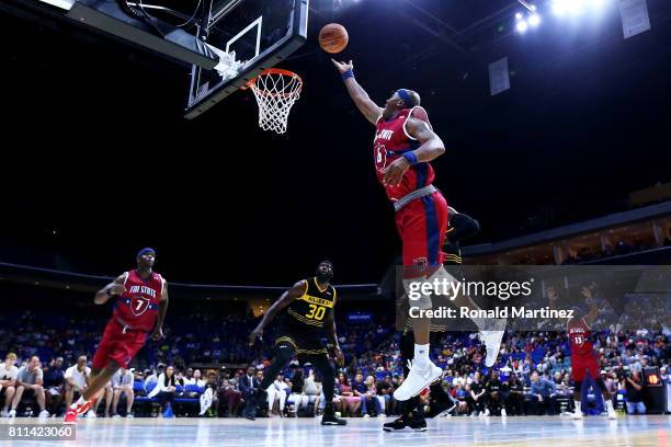 Bonzi Wells of Tri-State attempts a shot against the Killer 3s during week three of the BIG3 three on three basketball league at BOK Center on July...