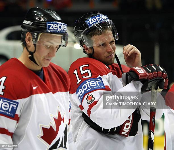 Canada's Jay Bowmeester and Dany Heatley after losing 5-4 in overtimet to Russia at the gold medal game of the 2008 IIHF World Hockey Championships...