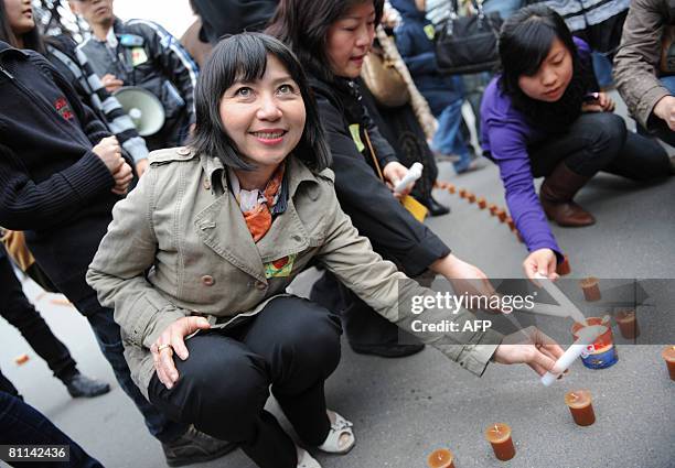 Writer Anh-Dao Traxel, foster daughter of French former President Jacques Chirac, takes part in ceremony under Eiffel Tower in Paris on May 18, 2008...