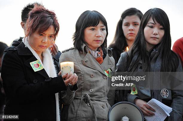 Writer Anh-Dao Traxel , foster daughter of French former President Jacques Chirac, takes part in ceremony under Eiffel Tower in Paris on May 18, 2008...