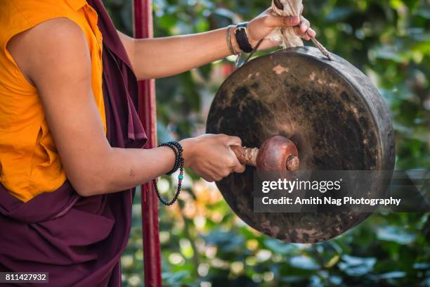time for the buddhist prayer - gong stock pictures, royalty-free photos & images