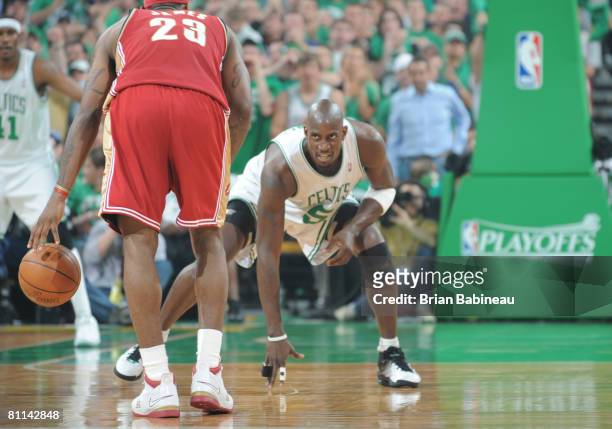 Kevin Garnett of the Boston Celtics defends Lebron James of the Cleveland Cavaliers in Game Seven of the Eastern Conference Semifinals during the...