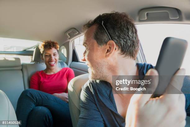 Rideshare Driver Using Phone Rideshare Bad Photos and Premium High Res Pictures - Getty Images