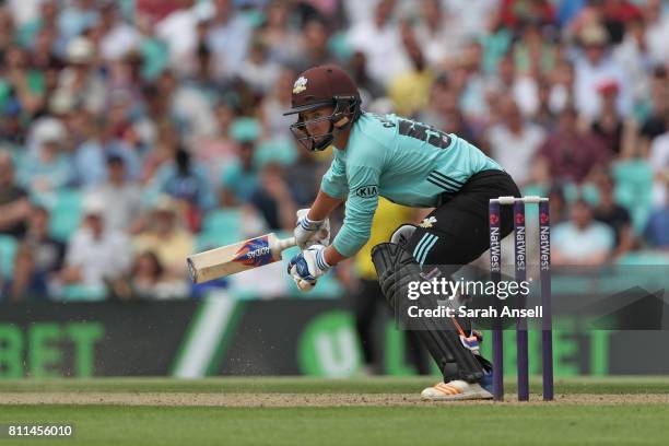 Sam Curran of Surrey hits out during the NatWest T20 Blast match at The Kia Oval on July 9, 2017 in London, England. .