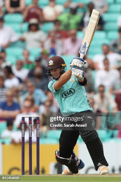 Tom Curran of Surrey hits out during the NatWest T20 Blast match at The Kia Oval on July 9, 2017 in London, England. .