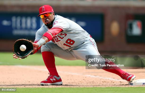 Luis Valbuena of the Los Angeles Angels makes the out against the Texas Rangers in the bottom of the seventh inning at Globe Life Park in Arlington...