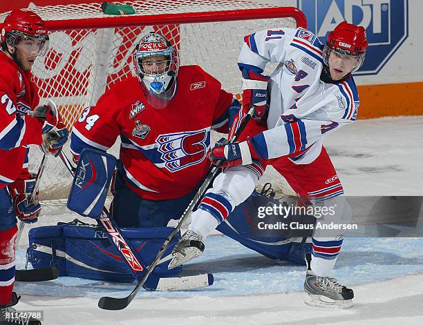 Nick Spaling of the Kitchener Rangers gets set to deflect an incoming shot at Dutin Tokarski of the Spokane Chiefs in a Memorial Cup round robin game...