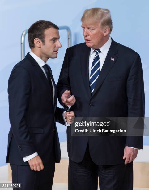 Summit in Hamburg. Donald Trump, President of the United States of America, in conversation with the French President Emmanuel Macron.