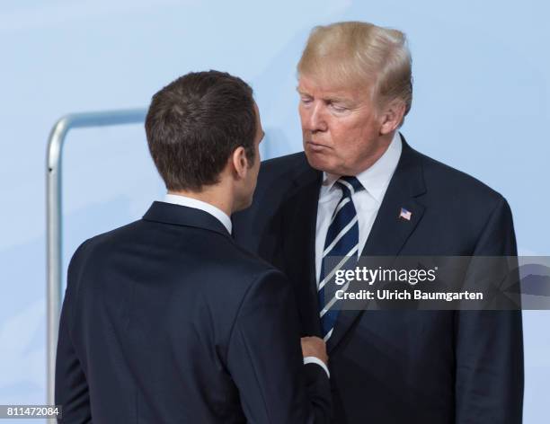 Summit in Hamburg. Donald Trump, President of the United States of America, in conversation with the French President Emmanuel Macron.