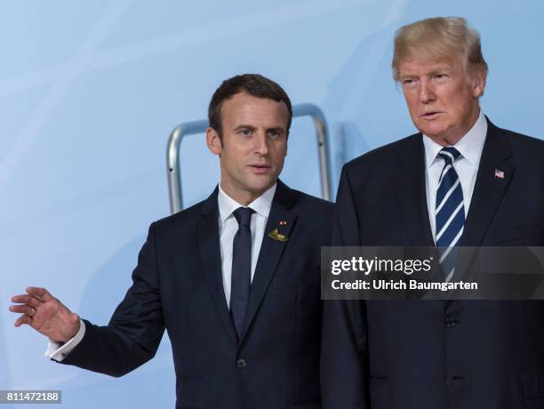 Summit in Hamburg. Donald Trump, President of the United States of America, in conversation with the French President Emmanuel Macron.