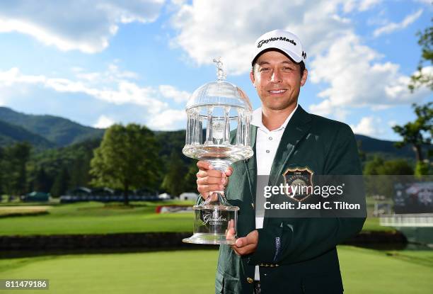 Xander Schauffele poses with the trophy after the final round of The Greenbrier Classic held at the Old White TPC on July 9, 2017 in White Sulphur...