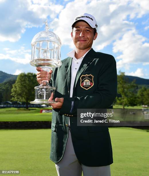 Xander Schauffele poses with the trophy after the final round of The Greenbrier Classic held at the Old White TPC on July 9, 2017 in White Sulphur...