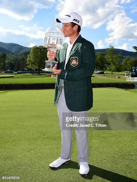 Xander Schauffele poses with the trophy after the final round of The Greenbrier Classic held at the Old White TPC on July 9, 2017 in White Sulphur...