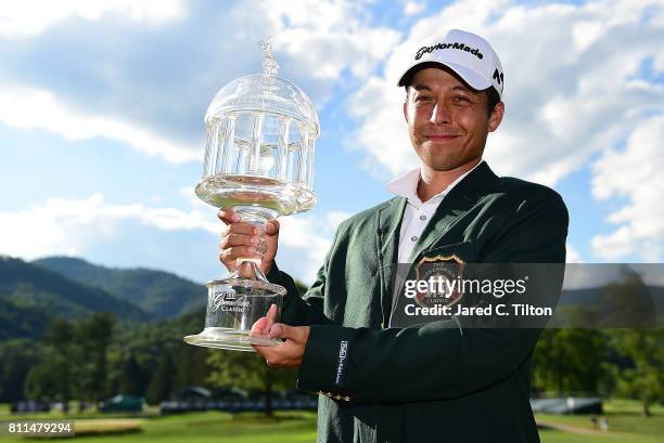 Xander Schauffele poses with the trophy after the final round of The Greenbrier Classic held at the Old White TPC on July 9, 2017 in White Sulphur...