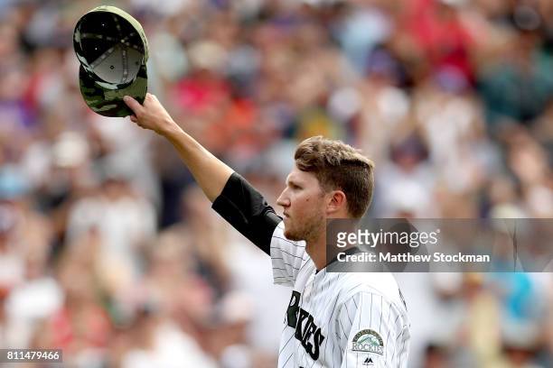 Starting pitcher Kyle Freeland of the Colorado Rockies acknowledges the crowd as he leaves the game in the ninth inning against the Chicago White Sox...