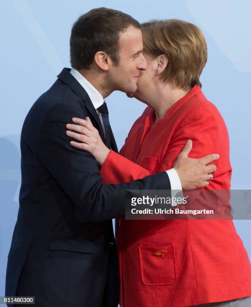 Summit in Hamburg. Cordialities - Federal Chancellor Angela Merkel and the French President Emmanuel Macron.