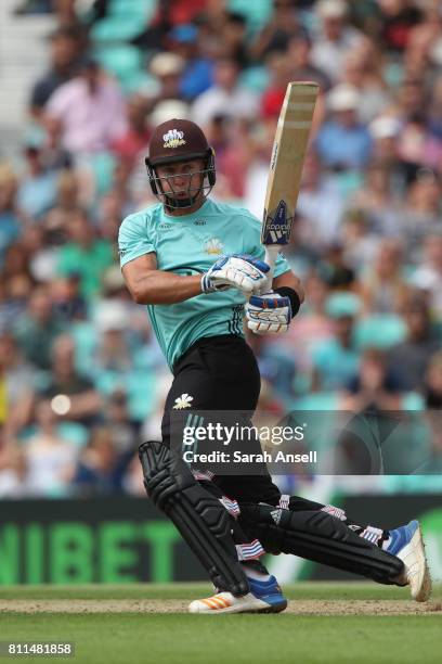 Tom Curran of Surrey hits out during the NatWest T20 Blast match at The Kia Oval on July 9, 2017 in London, England.