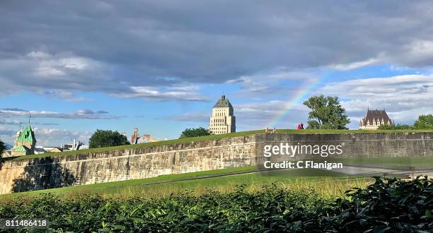 General view of the atmosphere and a rainbow over the rampart fortification walls of Quebec City during the 2017 Festival d'ete de Quebec on July 9,...