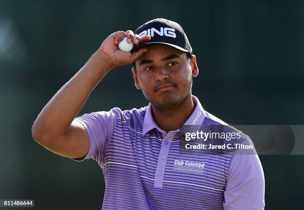 Sebastian Munoz of Colombia reacts on the 18th green during the final round of The Greenbrier Classic held at the Old White TPC on July 9, 2017 in...