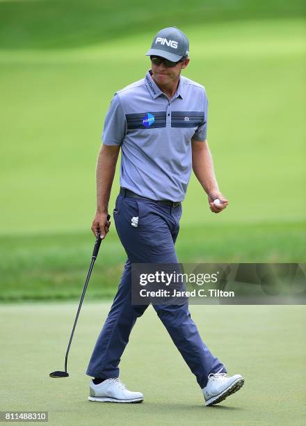 Seamus Power of Ireland reacts after his putt on the fifth green during the final round of The Greenbrier Classic held at the Old White TPC on July...