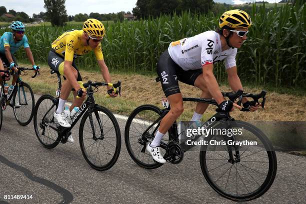 Christopher Froome of Great Britain riding for Team Sky in the leader's jersey and Geraint Thomas of Great Britain riding for Team Sky ride talk...