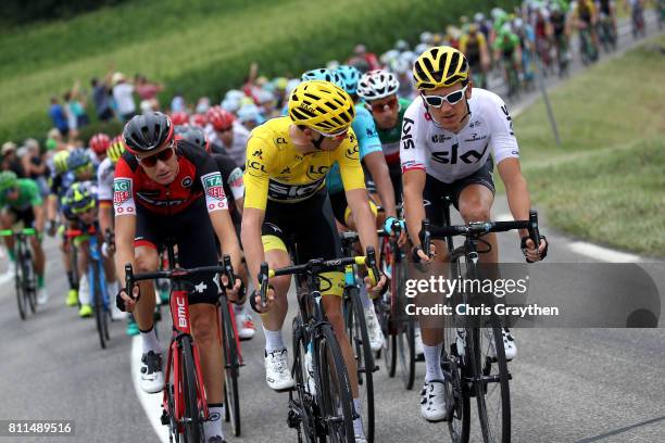 Christopher Froome of Great Britain riding for Team Sky in the leader's jersey and Geraint Thomas of Great Britain riding for Team Sky ride talk...