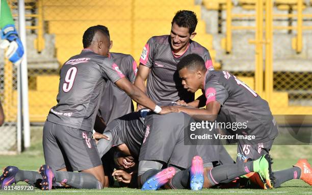 Miguel Perez of Tigres FC celebrates with teammates after scoring the opening goal of his team during a match between Tigres FC and Once Caldas as...