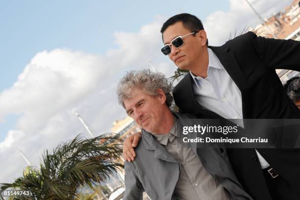 Director Wong Kar Wai and Christopher Doyle attend the Ashes of Time photocall at the Palais des Festivals during the 61st Cannes International Film...