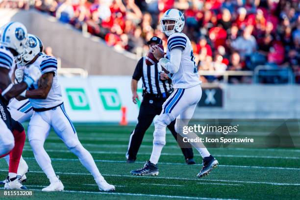 Toronto Argonauts quarterback Ricky Ray looks for a receiver down field during Canadian Football League action between the Toronto Argonauts and...