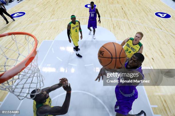 Ivan Johnson of the Ghost Ballers attempts a shot against the Ball Hogs during week three of the BIG3 three on three basketball league at BOK Center...