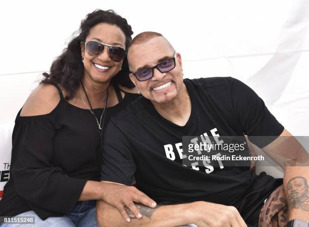 Comedian Sinbad and Meredith Adkins pose for portrait at "The Nineties" at the Pier presented by CNN at Santa Monica Pier on July 9, 2017 in Santa...
