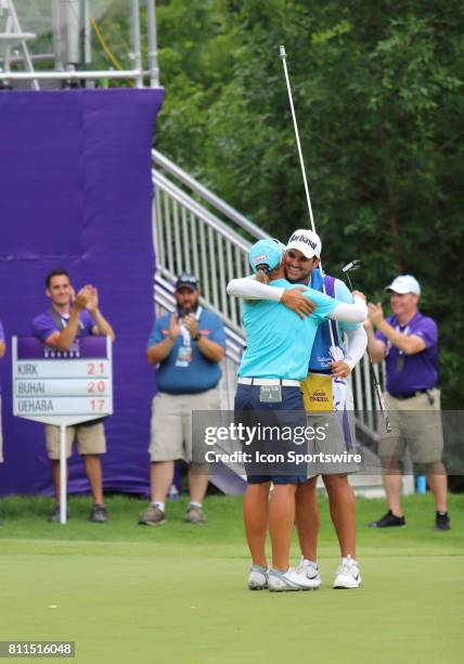 Katherine Kirk of Australia hugs her caddie after sinking a putt on hole number eighteen, winning the Thornberry Creek LPGA Classic at Thornberry...