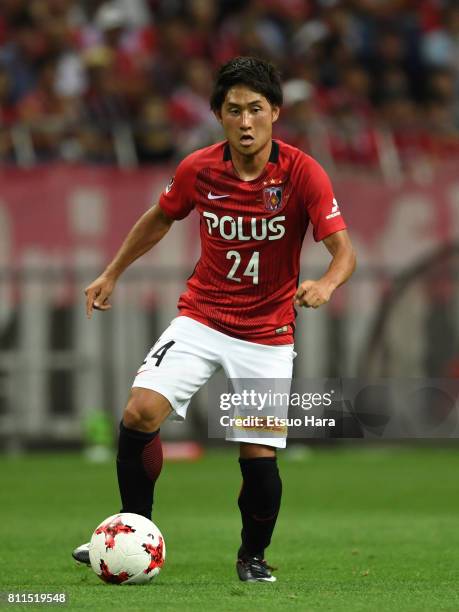 Takahiro Sekine of Urawa Red Diamonds in action during the J.League J1 match between Urawa Red Diamonds and Albirex Niigata at Saitama Stadium on...