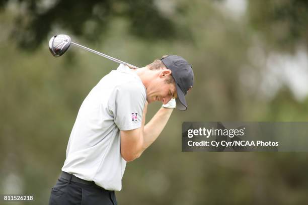 Jon Colten Stanaland of Huntingdon College injures himself after teeing off during the Division III Men's Golf Championship held at the Mission Inn...