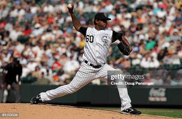 Pitcher Manny Corpas of the Colorado Rockies delivers against the Minnesota Twins during Interleague MLB action at Coors Field on May 18, 2008 in...