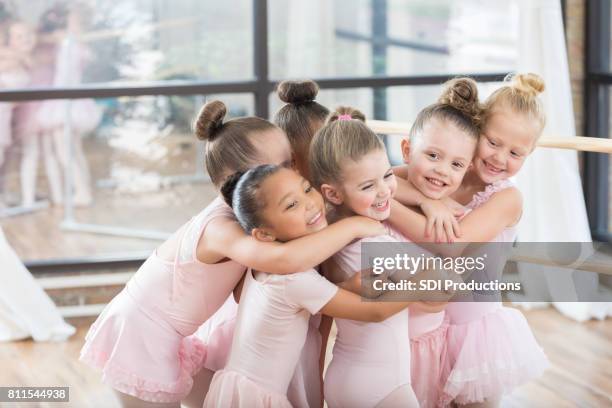 playful group of young ballerinas - dance performance stock pictures, royalty-free photos & images