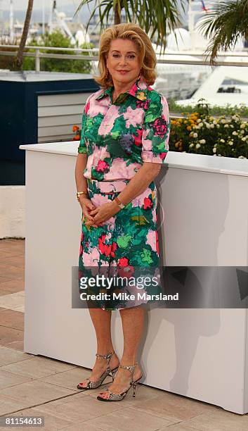 Catherine Deneuve attends the " Un Conte de Noel Photocall" photocall at the Palais des Festivals during the 61st Cannes International Film Festival...
