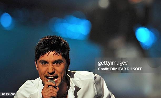 Dima Bilan of Russia performs during the 2008 Eurovision Song Contest semi-final dress rehearsal at Belgrade Arena on May 19, 2008. AFP PHOTO/DIMITAR...