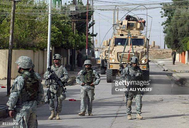 Soldiers from the 3rd squadron 3rd armored cavalry are seen during a joint patrol with Iraqi soldiers of the 2nd division in the northern al-Sukkar...