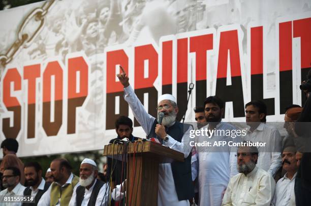 In this photograph taken on July 9, 2017 Siraj-ul-Haq, ameer of Jamaat-e-Islami party, gestures during a rally to mark the first anniversary of the...