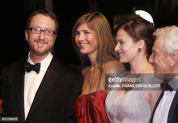 Director James Gray poses as he arrives with his wife Alexandra Dickson and US actress Vinessa Shaw and Israeli actor Moni Moshonov to attend the...