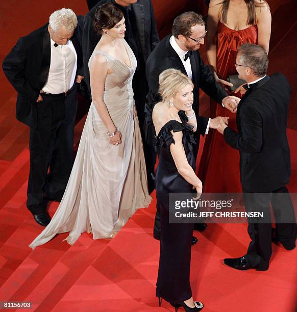The festival's artistic director Thierry Fremaux greets US director James Gray and his wife Alexandra Dickson , actresses Gwyneth Paltrow and Vinessa...