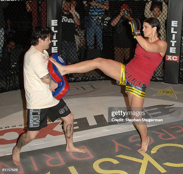 Fighter Gina Carano demonstrates MMA fighter techniques at CBS's "Elite XC Saturday Night Fights" Press Conference at CBS Radford Studios on May 19,...