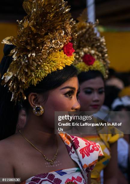 Teenage girl in traditional costume before a tooth filing ceremony, Bali island, Canggu, Indonesia on July 22, 2015 in Canggu, Indonesia.