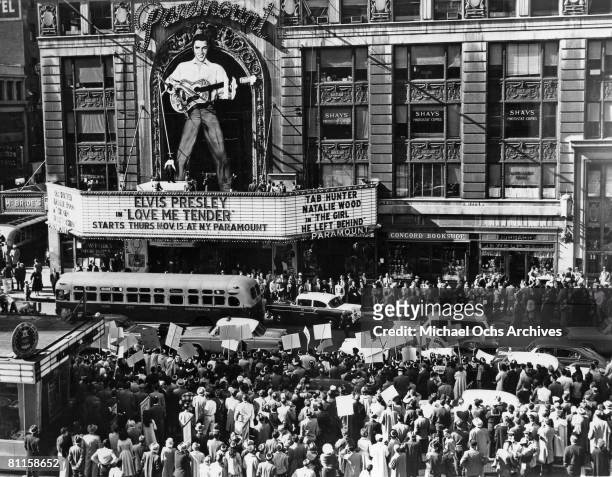Photo of Paramount Theater, advertising the Elvis Presley film 'Love Me Tender'.