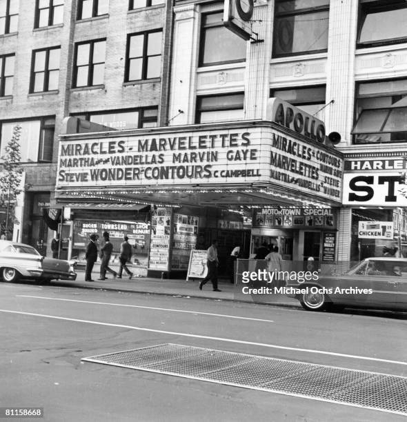 Exterior view of the Apollo Theater, New York, New York, early to mid 1960s. The marquee advertises performers including the Miracles, the...