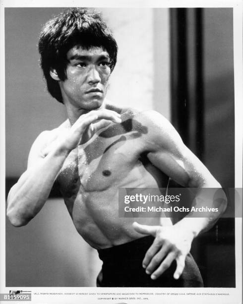 Actor and martial artist Bruce Lee in a Warner Bros publicity still for 'Enter the Dragon', directed by Robert Clouse, Hong Kong, 1973.