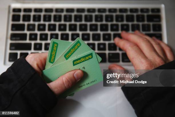 Medicare cards are seen on July 10, 2017 in Melbourne, Australia. The Federal Goverment has announced a review of Medicare's online security...