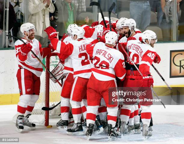 Kris Draper and the Detroit Red Wings celebrate after defeating the Dallas Stars in game six of the Western Conference Finals of the 2008 NHL Stanley...