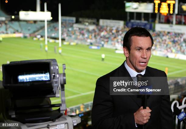 Channel nine commentator Matthew Johns addresses the television audience before the round 10 NRL match between the Parramatta Eels and the Sydney...